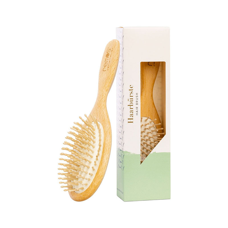 Hairbrush with wooden pins made of beechwood for thick hair