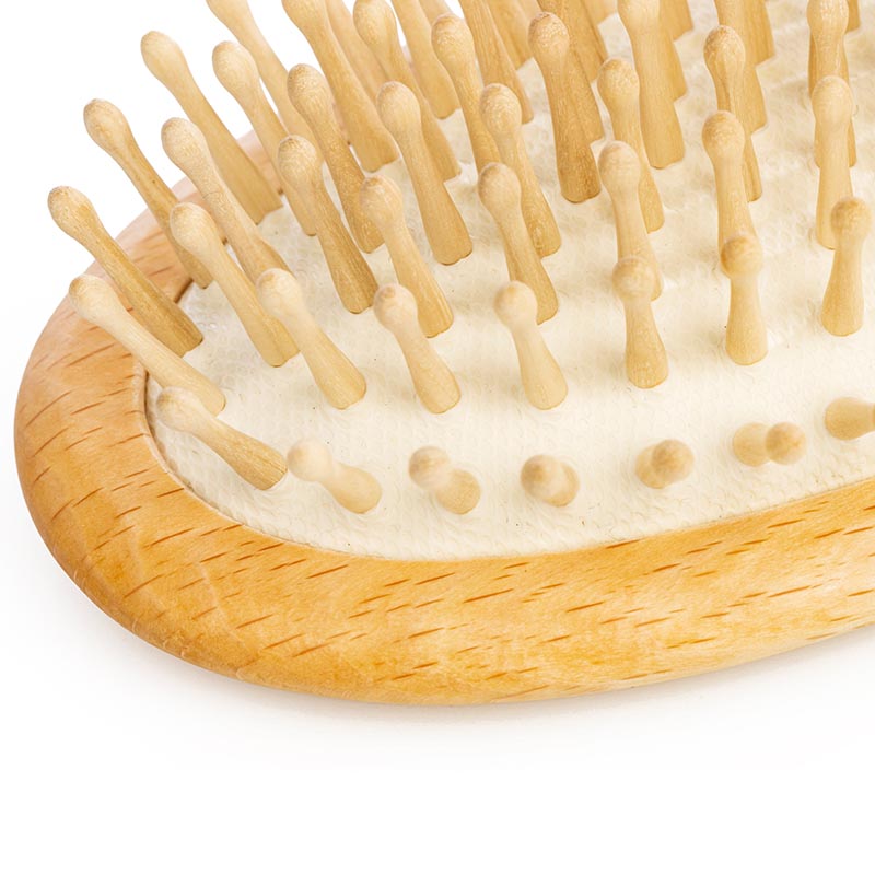 Hairbrush with wooden pins made of beechwood for thick hair