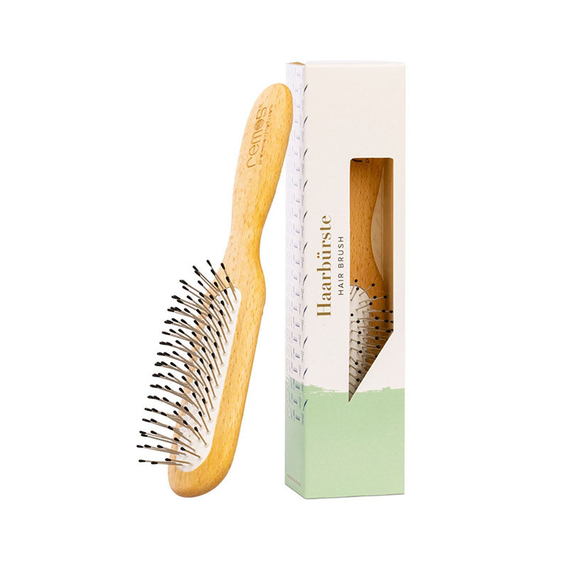 Haarbürste mit Stahlstiften und Noppen