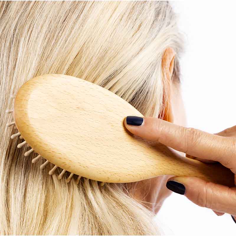 Hairbrush with wooden pins made of beechwood for thick hair