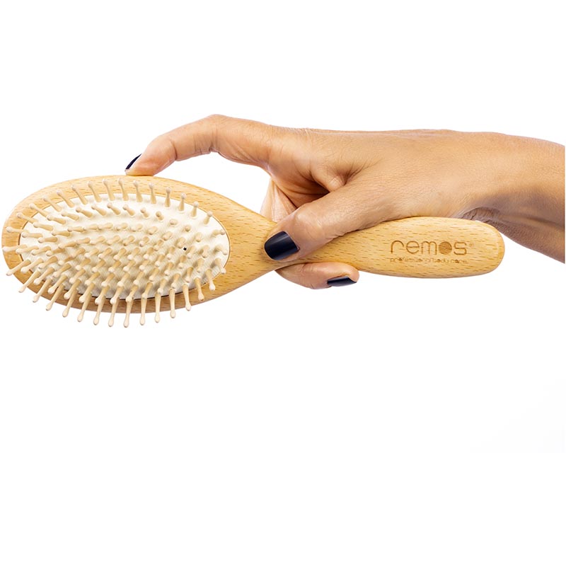Hairbrush with wooden pins made of beechwood for thick hair