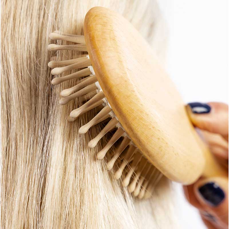 Hairbrush with wooden pins made of beechwood for thick hair