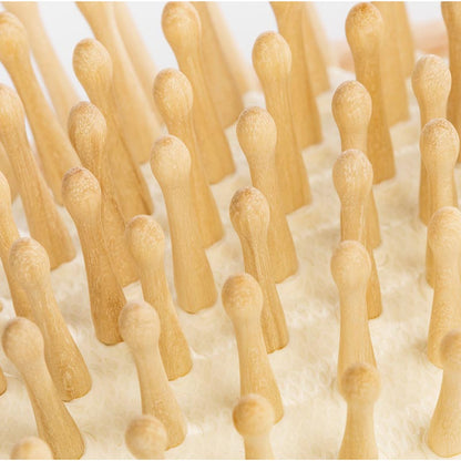 Hairbrush with wooden pins made of beechwood for thick hair