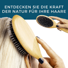 oval Cushion brush with pure black wild boar bristles and nylon pins.