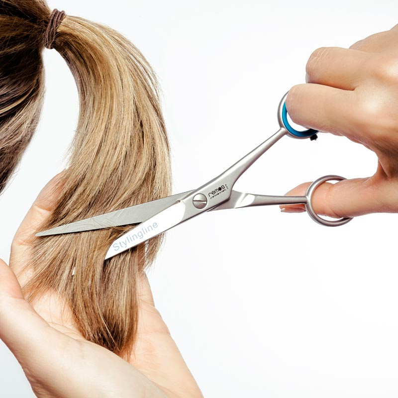 cutting hair with scissors